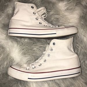 Barely worn white converse high tops.